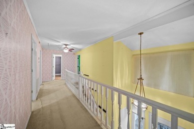 From the colorful front door, to the playful kitchen cupboards on Pebble Creek Golf Club in South Carolina - for sale on GolfHomes.com, golf home, golf lot