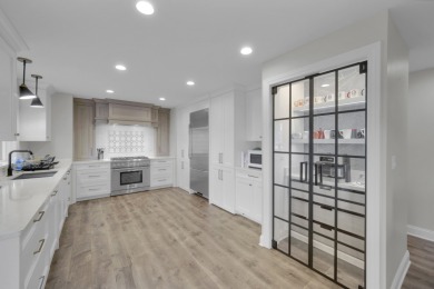 Nestled in the heart of White Eagle Club, this fully renovated on White Eagle Golf Club in Illinois - for sale on GolfHomes.com, golf home, golf lot
