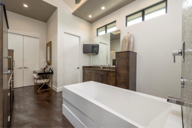 This custom-built contemporary masterpiece exudes refined on Mira Vista Country Club in Texas - for sale on GolfHomes.com, golf home, golf lot