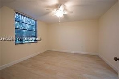 Wake up every morning to peaceful golf course views in one of on Pine Island Ridge Country Club in Florida - for sale on GolfHomes.com, golf home, golf lot