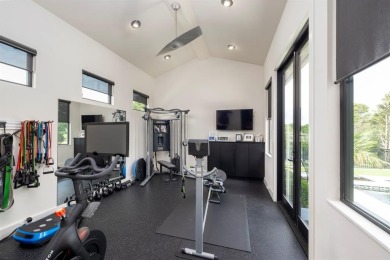 This custom-built contemporary masterpiece exudes refined on Mira Vista Country Club in Texas - for sale on GolfHomes.com, golf home, golf lot