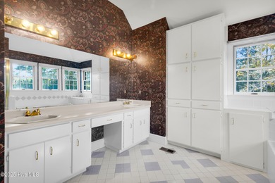 Discover timeless elegance in this custom brick home nestled in on Emerald Golf Club in North Carolina - for sale on GolfHomes.com, golf home, golf lot