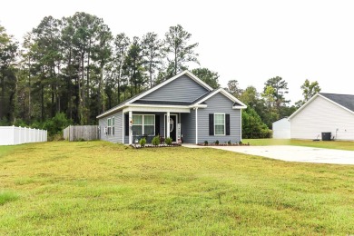 Welcome to 6773 SC 66 in Loris, where charm and comfort meet on on Woodland Valley Country Club in South Carolina - for sale on GolfHomes.com, golf home, golf lot