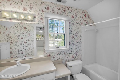 Discover timeless elegance in this custom brick home nestled in on Emerald Golf Club in North Carolina - for sale on GolfHomes.com, golf home, golf lot