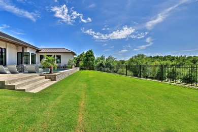 This custom-built contemporary masterpiece exudes refined on Mira Vista Country Club in Texas - for sale on GolfHomes.com, golf home, golf lot