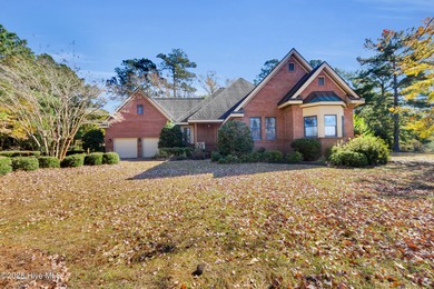 Discover timeless elegance in this custom brick home nestled in on Emerald Golf Club in North Carolina - for sale on GolfHomes.com, golf home, golf lot