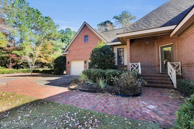 Discover timeless elegance in this custom brick home nestled in on Emerald Golf Club in North Carolina - for sale on GolfHomes.com, golf home, golf lot