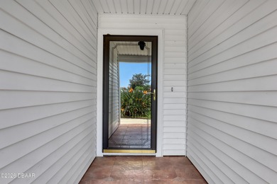 Florida Living at Its Best! Beautifully updated 3 bed/2 bath on New Smyrna Beach Golf Course in Florida - for sale on GolfHomes.com, golf home, golf lot