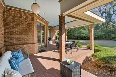 Discover timeless elegance in this custom brick home nestled in on Emerald Golf Club in North Carolina - for sale on GolfHomes.com, golf home, golf lot