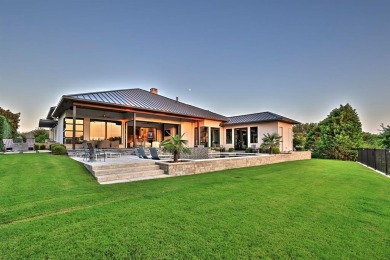 This custom-built contemporary masterpiece exudes refined on Mira Vista Country Club in Texas - for sale on GolfHomes.com, golf home, golf lot
