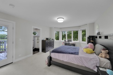 Nestled in the heart of White Eagle Club, this fully renovated on White Eagle Golf Club in Illinois - for sale on GolfHomes.com, golf home, golf lot