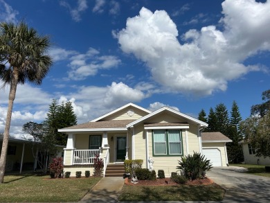 GORGEOUS OPEN AND SPLIT FLOOR PLAN HOME WITH TRAY CEILINGS AND on Silver Dollar Golf and Trap Club in Florida - for sale on GolfHomes.com, golf home, golf lot