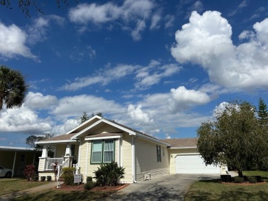 GORGEOUS OPEN AND SPLIT FLOOR PLAN HOME WITH TRAY CEILINGS AND on Silver Dollar Golf and Trap Club in Florida - for sale on GolfHomes.com, golf home, golf lot