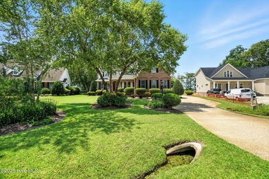 Beautiful home located in the prestigious, gated community of on Sound Golf Links at Albemarle Plantation in North Carolina - for sale on GolfHomes.com, golf home, golf lot
