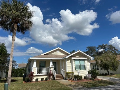 GORGEOUS OPEN AND SPLIT FLOOR PLAN HOME WITH TRAY CEILINGS AND on Silver Dollar Golf and Trap Club in Florida - for sale on GolfHomes.com, golf home, golf lot