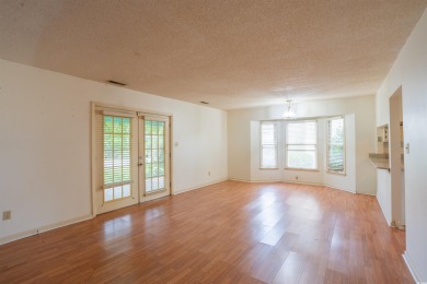 This 3 bedroom, 2.5 bath two-story home with a fireplace is the on Myrtlewood Golf Course and Club  in South Carolina - for sale on GolfHomes.com, golf home, golf lot