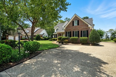 Beautiful home located in the prestigious, gated community of on Sound Golf Links at Albemarle Plantation in North Carolina - for sale on GolfHomes.com, golf home, golf lot