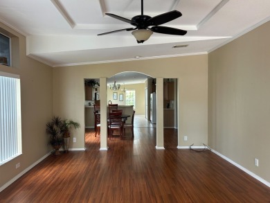 GORGEOUS OPEN AND SPLIT FLOOR PLAN HOME WITH TRAY CEILINGS AND on Silver Dollar Golf and Trap Club in Florida - for sale on GolfHomes.com, golf home, golf lot