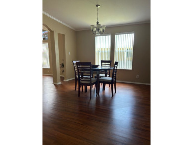 GORGEOUS OPEN AND SPLIT FLOOR PLAN HOME WITH TRAY CEILINGS AND on Silver Dollar Golf and Trap Club in Florida - for sale on GolfHomes.com, golf home, golf lot