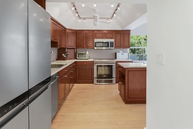 Bathe yourself in Light in this spacious 1st-floor unit offering on Boca Grove Golf and Tennis in Florida - for sale on GolfHomes.com, golf home, golf lot