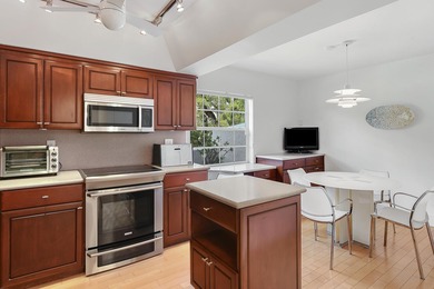 Bathe yourself in Light in this spacious 1st-floor unit offering on Boca Grove Golf and Tennis in Florida - for sale on GolfHomes.com, golf home, golf lot