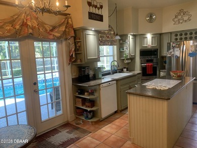 WOW! Rare offering. This spacious 3/2.5 Pool home sits on a half on The Club At Pelican Bay - North Course in Florida - for sale on GolfHomes.com, golf home, golf lot