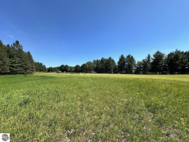 Beautiful, and lightly treed, lot overlooking the 4th fairway at on Shanty Creek Golf Course in Michigan - for sale on GolfHomes.com, golf home, golf lot