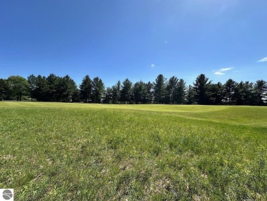 Beautiful, and lightly treed, lot overlooking the 4th fairway at on Shanty Creek Golf Course in Michigan - for sale on GolfHomes.com, golf home, golf lot