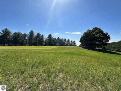 Beautiful, and lightly treed, lot overlooking the 4th fairway at on Shanty Creek Golf Course in Michigan - for sale on GolfHomes.com, golf home, golf lot