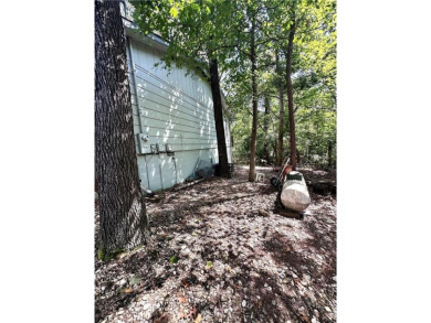 Endless potential in Bella Vista! Tucked away in a quiet on Bella Vista Country Club - Kingswood in Arkansas - for sale on GolfHomes.com, golf home, golf lot