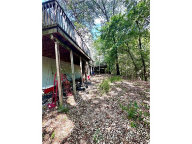 Endless potential in Bella Vista! Tucked away in a quiet on Bella Vista Country Club - Kingswood in Arkansas - for sale on GolfHomes.com, golf home, golf lot