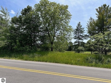 Beautiful, and lightly treed, lot overlooks the 4th fairway at on Shanty Creek Golf Course in Michigan - for sale on GolfHomes.com, golf home, golf lot