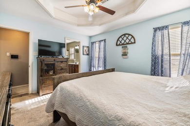 This charming 3 bedroom, 2 bath home is nestled in the highly on Silver Springs Country Club in Arkansas - for sale on GolfHomes.com, golf home, golf lot