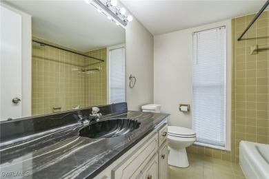 Wonderful second floor 2/2 unit looking out on the water of the on The Glades Golf and Country Club in Florida - for sale on GolfHomes.com, golf home, golf lot