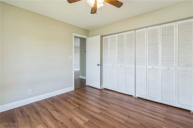 Wonderful second floor 2/2 unit looking out on the water of the on The Glades Golf and Country Club in Florida - for sale on GolfHomes.com, golf home, golf lot
