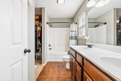 This charming 3 bedroom, 2 bath home is nestled in the highly on Silver Springs Country Club in Arkansas - for sale on GolfHomes.com, golf home, golf lot