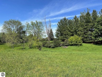 Beautiful, and lightly treed, lot overlooks the 4th fairway at on Shanty Creek Golf Course in Michigan - for sale on GolfHomes.com, golf home, golf lot