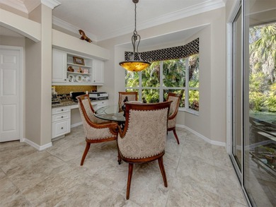 Exceptional courtyard home providing a refined blend of comfort on The Venice Golf and Country Club in Florida - for sale on GolfHomes.com, golf home, golf lot