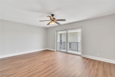Wonderful second floor 2/2 unit looking out on the water of the on The Glades Golf and Country Club in Florida - for sale on GolfHomes.com, golf home, golf lot