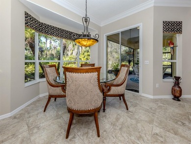 Exceptional courtyard home providing a refined blend of comfort on The Venice Golf and Country Club in Florida - for sale on GolfHomes.com, golf home, golf lot