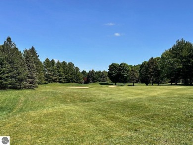 Beautiful, and lightly treed, lot overlooks the 4th fairway at on Shanty Creek Golf Course in Michigan - for sale on GolfHomes.com, golf home, golf lot