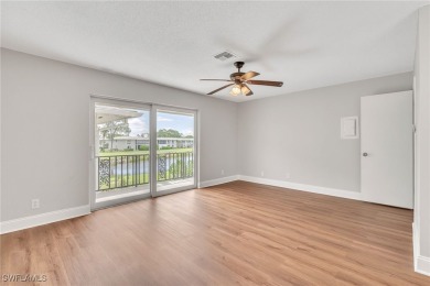 Wonderful second floor 2/2 unit looking out on the water of the on The Glades Golf and Country Club in Florida - for sale on GolfHomes.com, golf home, golf lot