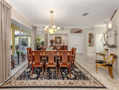 Exceptional courtyard home providing a refined blend of comfort on The Venice Golf and Country Club in Florida - for sale on GolfHomes.com, golf home, golf lot