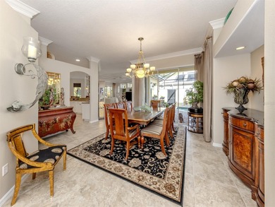 Exceptional courtyard home providing a refined blend of comfort on The Venice Golf and Country Club in Florida - for sale on GolfHomes.com, golf home, golf lot