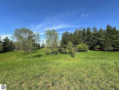 Beautiful, and lightly treed, lot overlooks the 4th fairway at on Shanty Creek Golf Course in Michigan - for sale on GolfHomes.com, golf home, golf lot