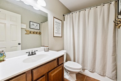 This charming 3 bedroom, 2 bath home is nestled in the highly on Silver Springs Country Club in Arkansas - for sale on GolfHomes.com, golf home, golf lot