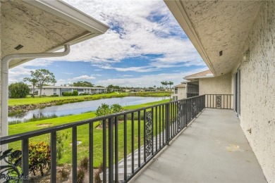 Wonderful second floor 2/2 unit looking out on the water of the on The Glades Golf and Country Club in Florida - for sale on GolfHomes.com, golf home, golf lot