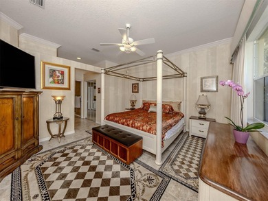 Exceptional courtyard home providing a refined blend of comfort on The Venice Golf and Country Club in Florida - for sale on GolfHomes.com, golf home, golf lot