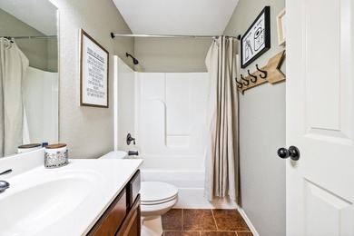 This charming 3 bedroom, 2 bath home is nestled in the highly on Silver Springs Country Club in Arkansas - for sale on GolfHomes.com, golf home, golf lot