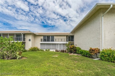 Wonderful second floor 2/2 unit looking out on the water of the on The Glades Golf and Country Club in Florida - for sale on GolfHomes.com, golf home, golf lot